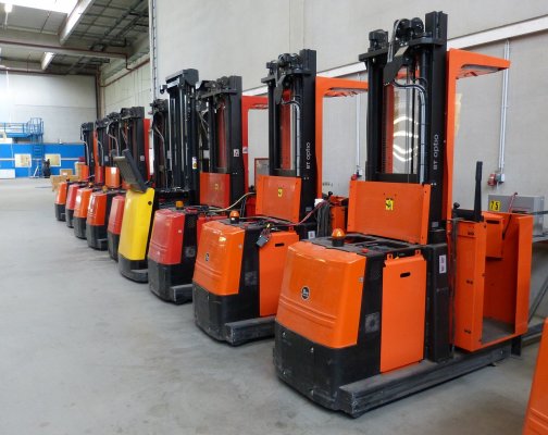 line of forklifts